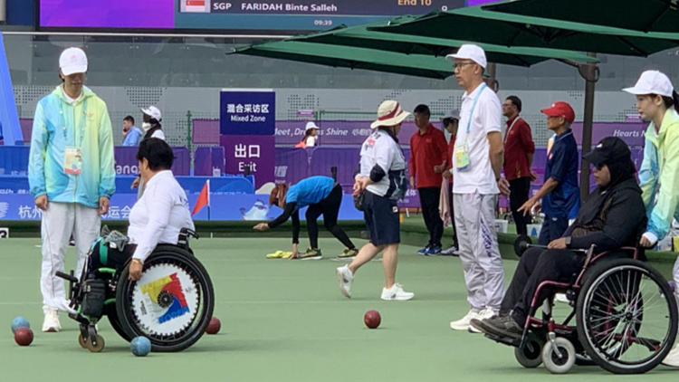 我校统战成员担任亚残运会草地掷球项目裁判